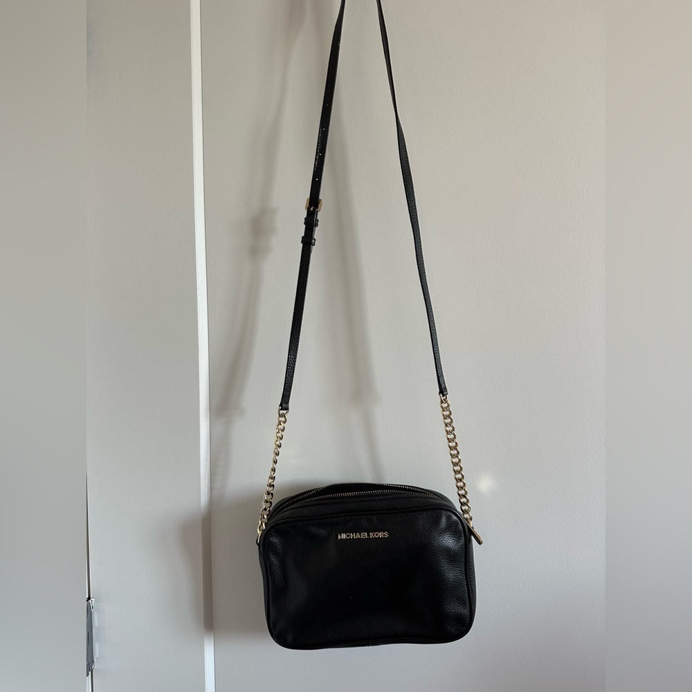 Michael Kors crossbody Light wear. Genuine Black leather.